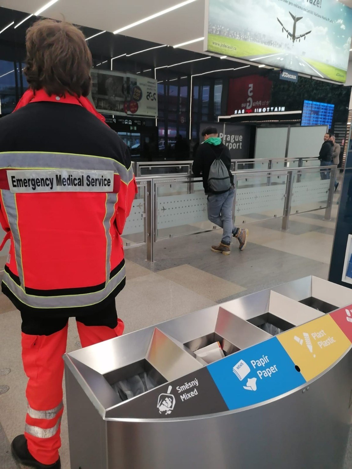 EMS jacket in an airport setting